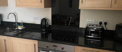 Apartment | Private kitchen | Fridge, microwave, oven, stovetop