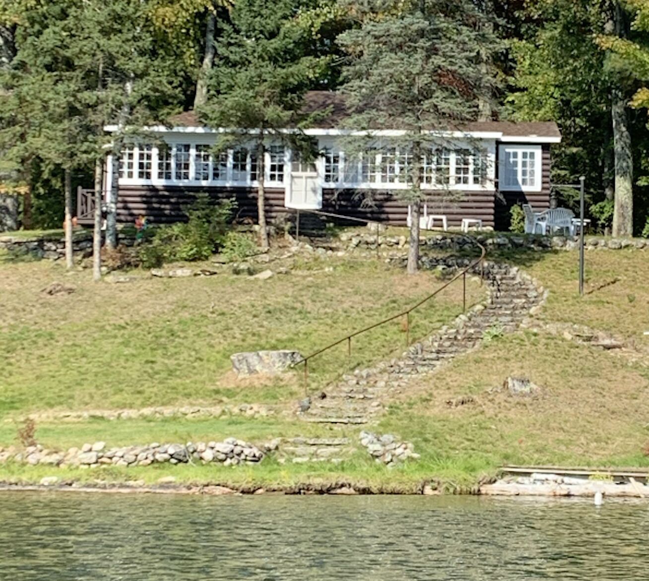 Spread Eagle Waterfront! Classic Log Cottage w/ King Bed