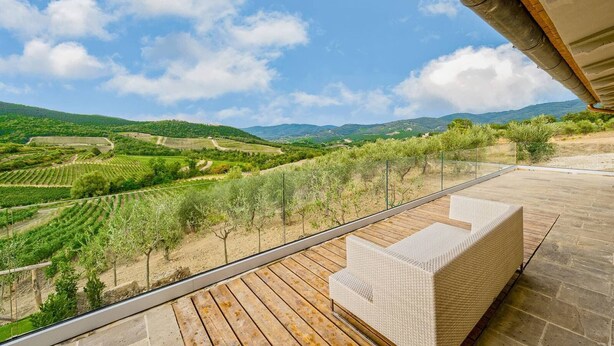 A balcony with a view of vineyards and hills. - VILLA CHIANTI ROSSO - Four Bedroom Villa, Sleeps 9 (Greve in Chianti)