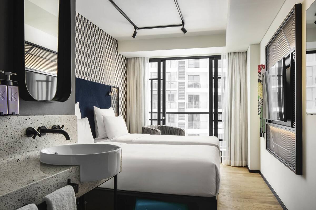 Habitación Confort, 2 camas individuales, balcón | Ropa de cama de alta calidad y minibar