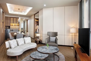 Presidential Suite, 1 King Bed | Living area | 50-inch LCD TV with cable channels
