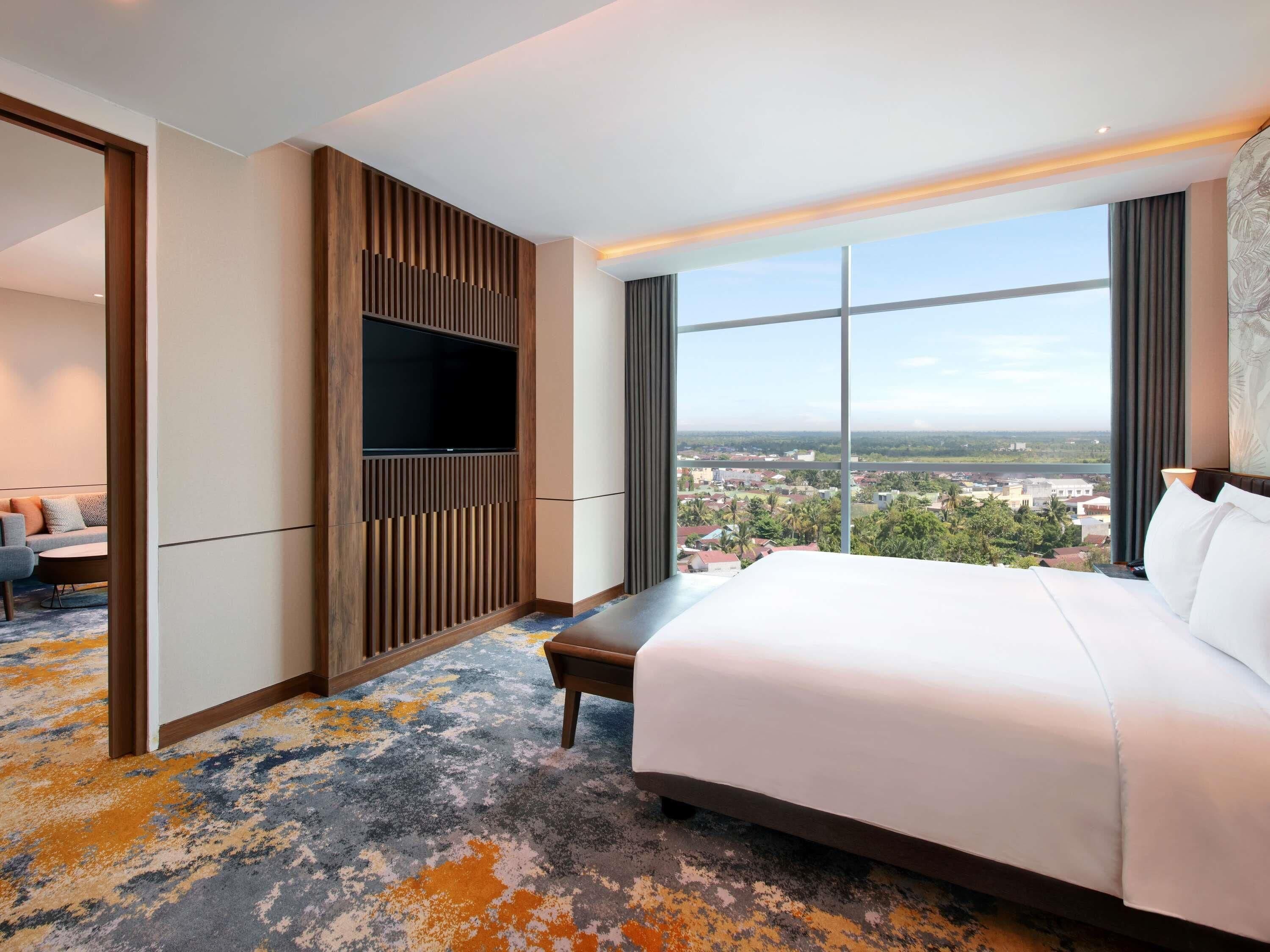 Suite ejecutiva, 1 cama doble | Minibar, caja fuerte, escritorio y espacio para trabajar con un portátil