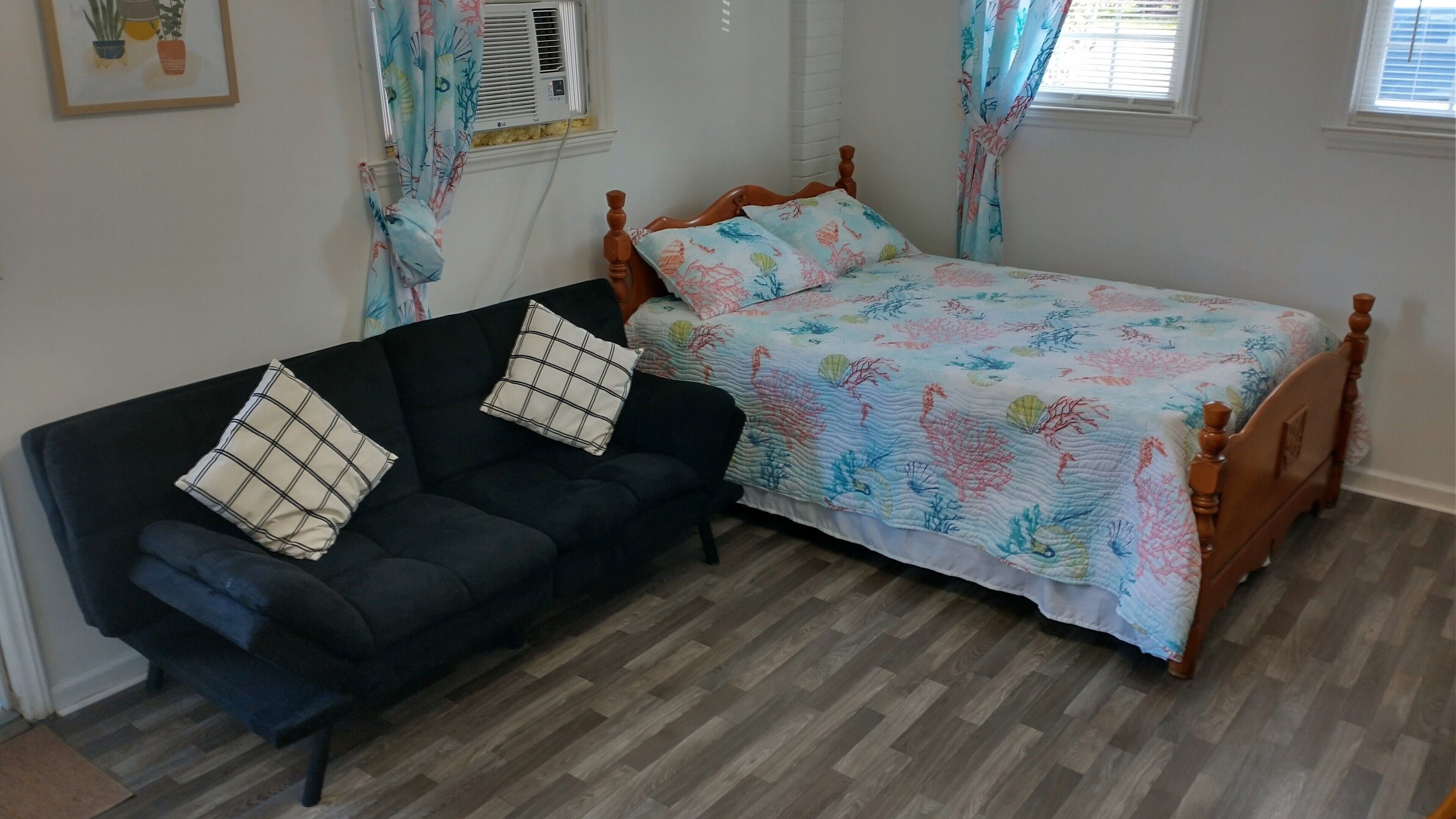 40th St En Suite /  Enter the door between Outside Shower and  Air Conditioner.