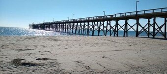 40th St En Suite /  Enter the door between Outside Shower and  Air Conditioner.