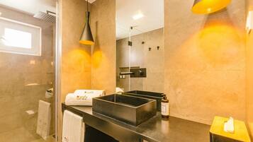 Shower, eco-friendly toiletries, hair dryer, towels