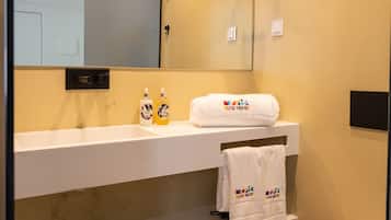 Shower, eco-friendly toiletries, hair dryer, towels
