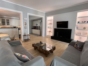 Luxury Apartment | Living area | Flat-screen TV