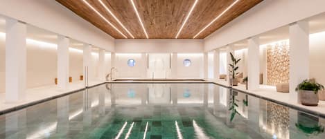 Indoor pool, 3 outdoor pools, open 10:00 AM to 7:00 PM, pool umbrellas