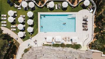 Indoor pool, 3 outdoor pools, open 10:00 AM to 7:00 PM, pool umbrellas