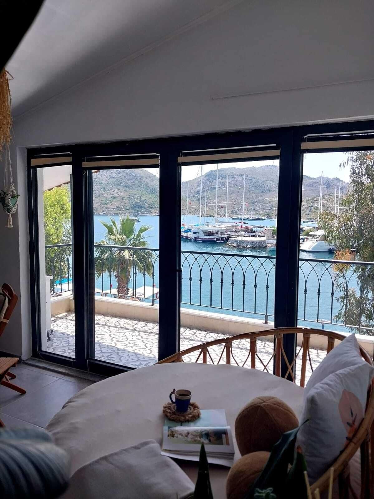 Panoramic Apartment, Sea View, Beachfront | Living area | 32-inch LCD TV with cable channels, TV