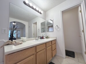 Shower, jetted bath, hair dryer, towels