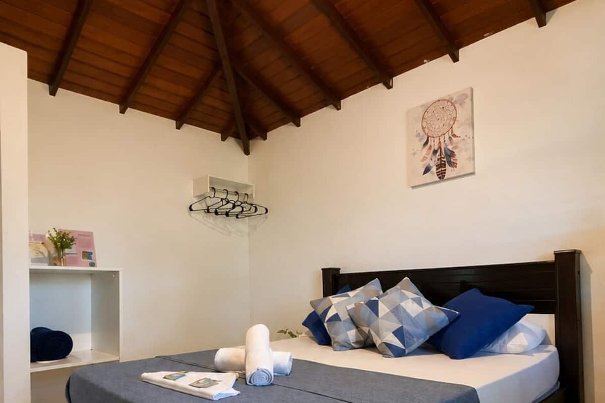 Standard Suite, 1 Bedroom, Garden View | 1 bedroom, WiFi (free), bed sheets