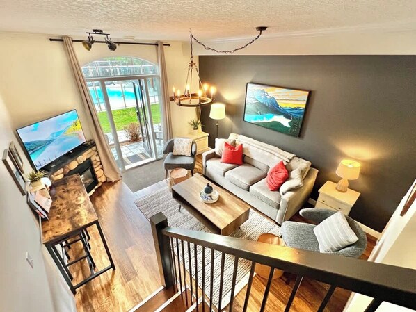 TV, fireplace, books, offices