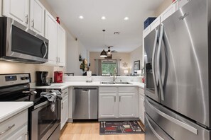 Fridge, microwave, oven, stovetop - Newly renovated beautiful second floor condo in Bahama Bay (Davenport)