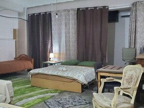 1 chambre, fer et planche à repasser, accès au Wi-Fi (inclus)