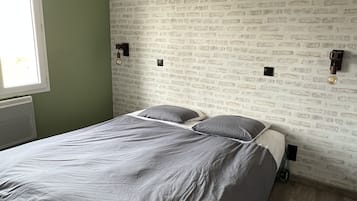 2 slaapkamers, een strijkplank/strijkijzer, reisbedje, wifi