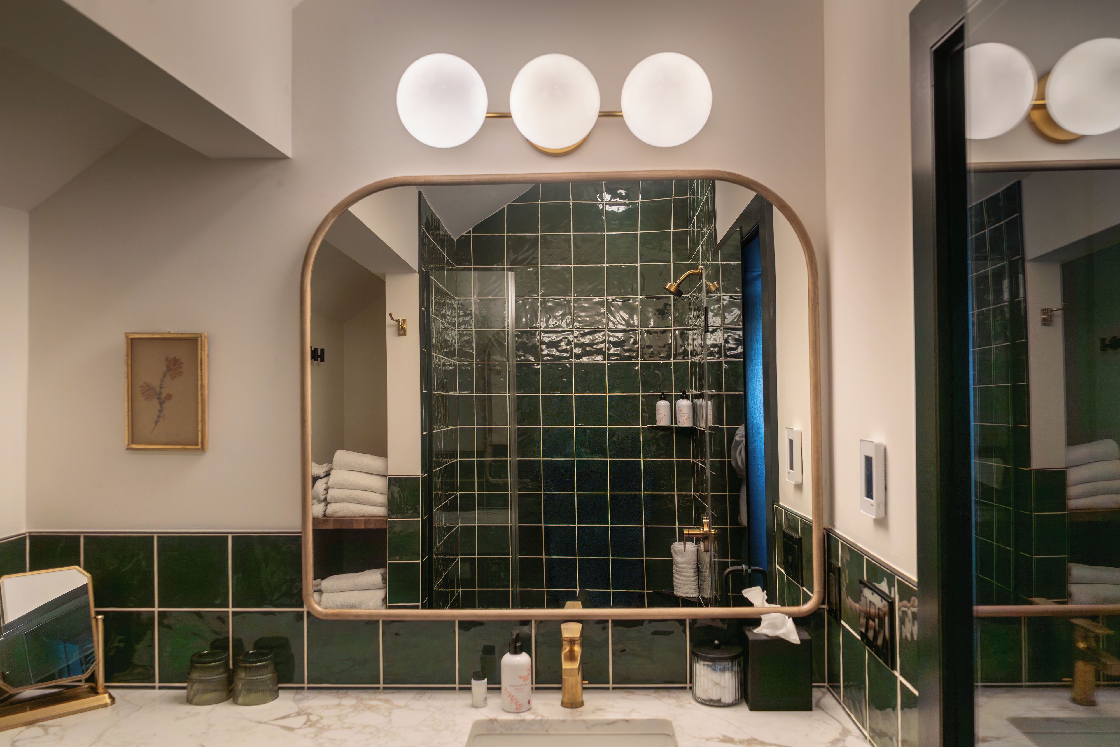 Deluxe Penthouse | Bathroom | Hair dryer, heated floors, towels, soap
