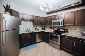 Fridge, microwave, oven, stovetop - Sanctuary Co Loft in Downtown Johnson City (Johnson City)