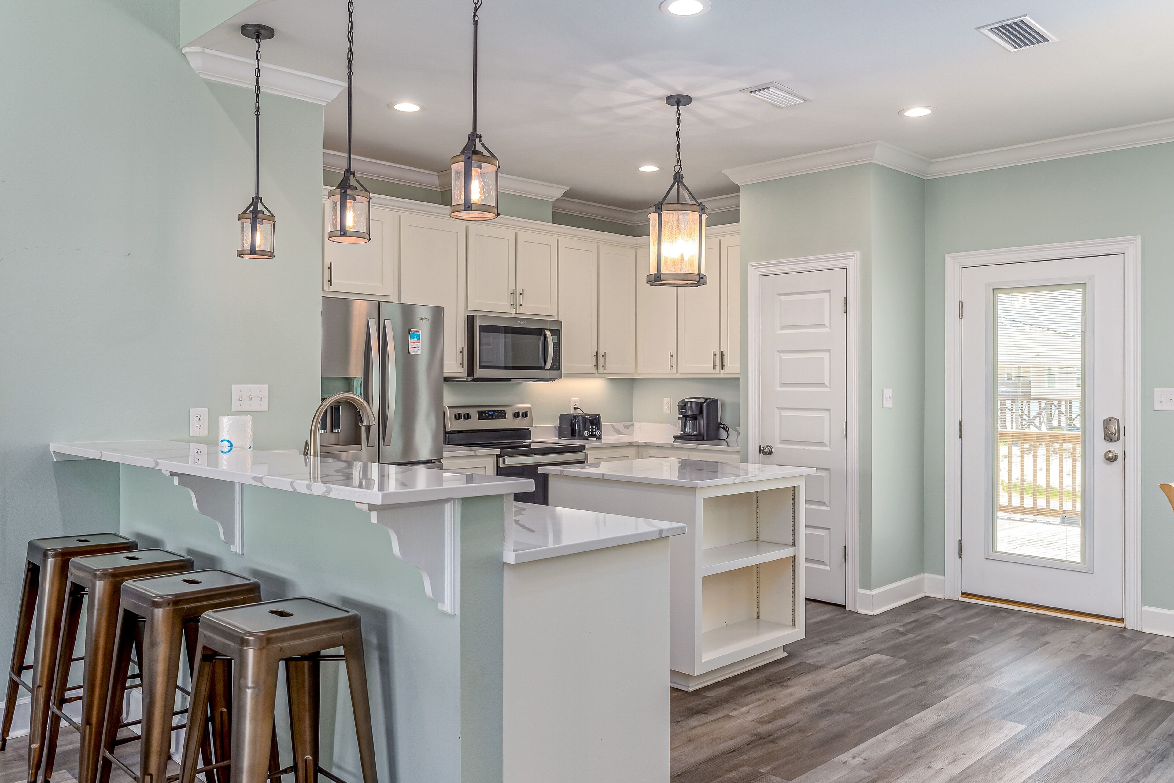 2nd-row beach house with Gulf views, deck, hot tub, grill, & WiFi - dog-friendly