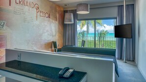 A hotel reception area with a large wall displaying the name 'Fernando Pessoa' and a desk with a telephone. - Vila Galé Alagoas - All Inclusive (Barra de Santo Antonio)