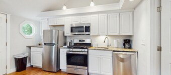 Charming updated bungalow with firepit, WiFi, & dog-friendly, near beach