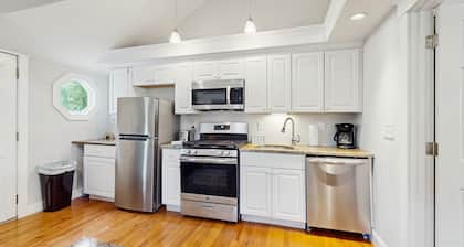 Charming updated bungalow with firepit, WiFi, & dog-friendly, near beach