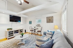 TV - Charming updated bungalow with firepit, WiFi, & dog-friendly, near beach (West Yarmouth)