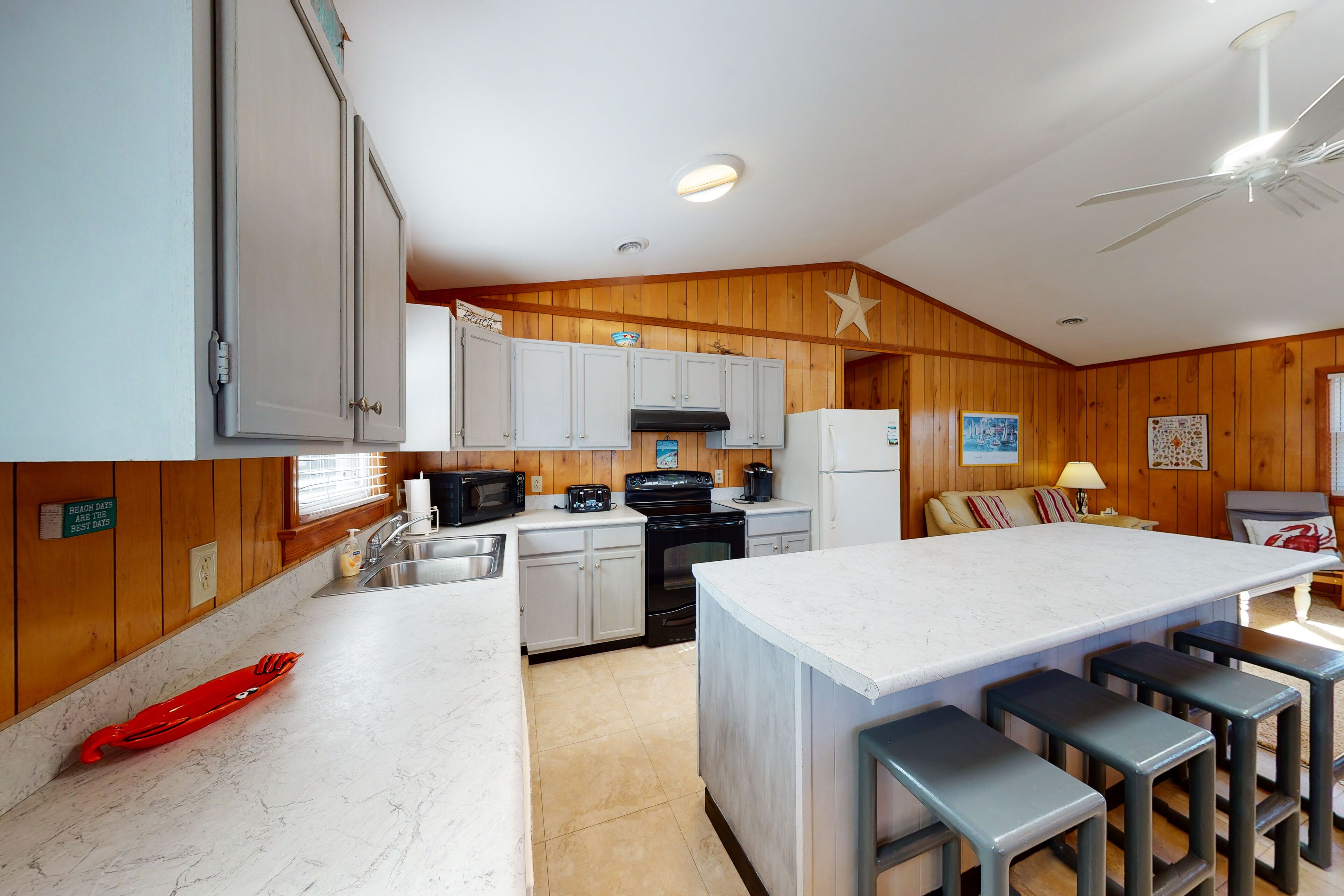 Beach view getaway with WiFi, rooftop deck, central AC, & washer/dryer