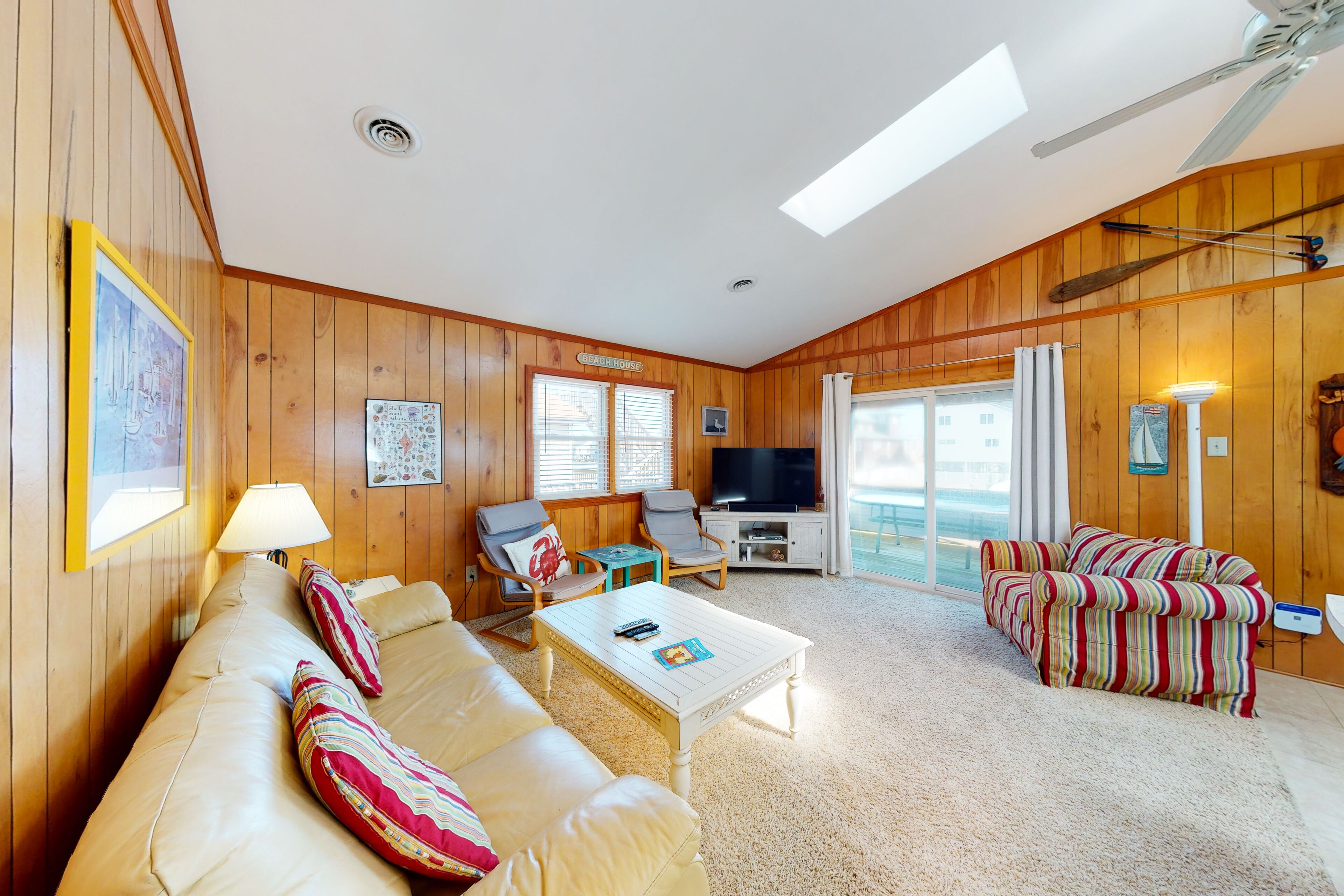 Beach view getaway with WiFi, rooftop deck, central AC, & washer/dryer