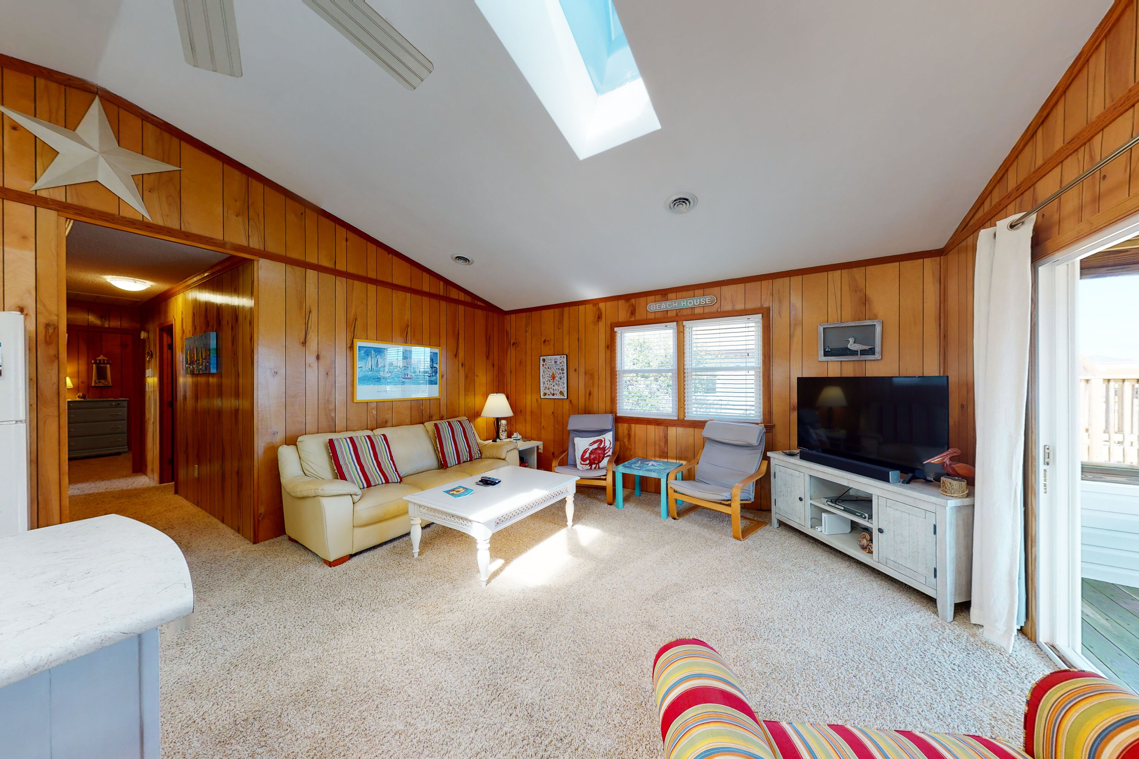 Beach view getaway with WiFi, rooftop deck, central AC, & washer/dryer