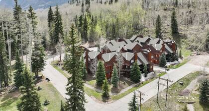 Two-story condo with a hot tub, WiFi, & wood-burning fireplace