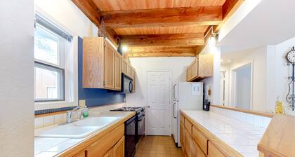 Two-story condo with a hot tub, WiFi, & wood-burning fireplace