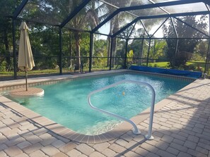 Outdoor pool, a heated pool - New house completed in Mar 2022 with pool and tiki bar! 15 min. to Gulf Beaches. (Englewood)