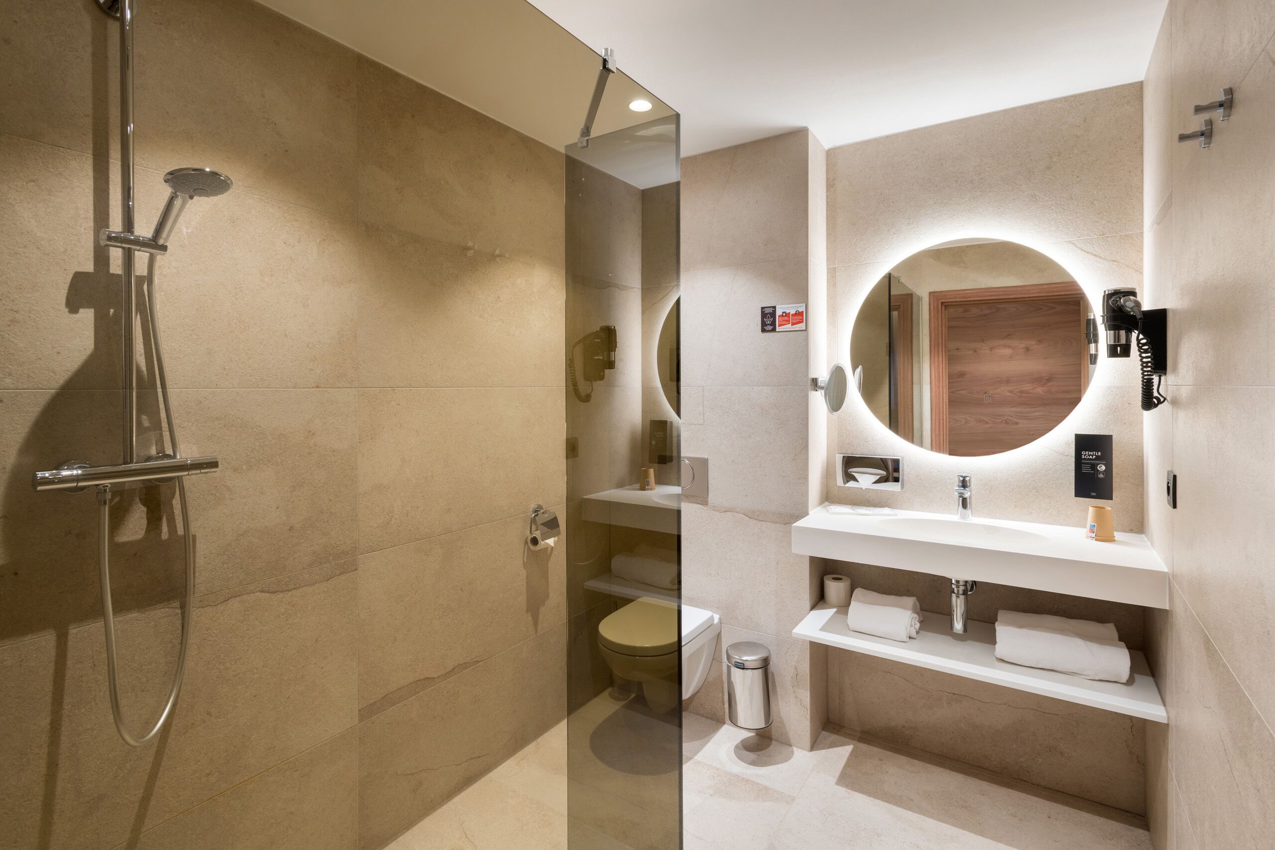 Shower, rainfall showerhead, hair dryer, towels