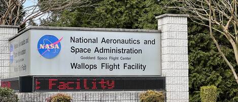 A sign for the National Aeronautics and Space Administration Goddard Space Flight Center Wallops Flight Facility.