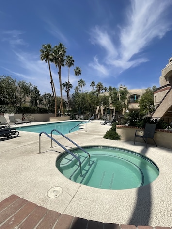 Pool and Hot Tub just steps from unit (with view from unit)