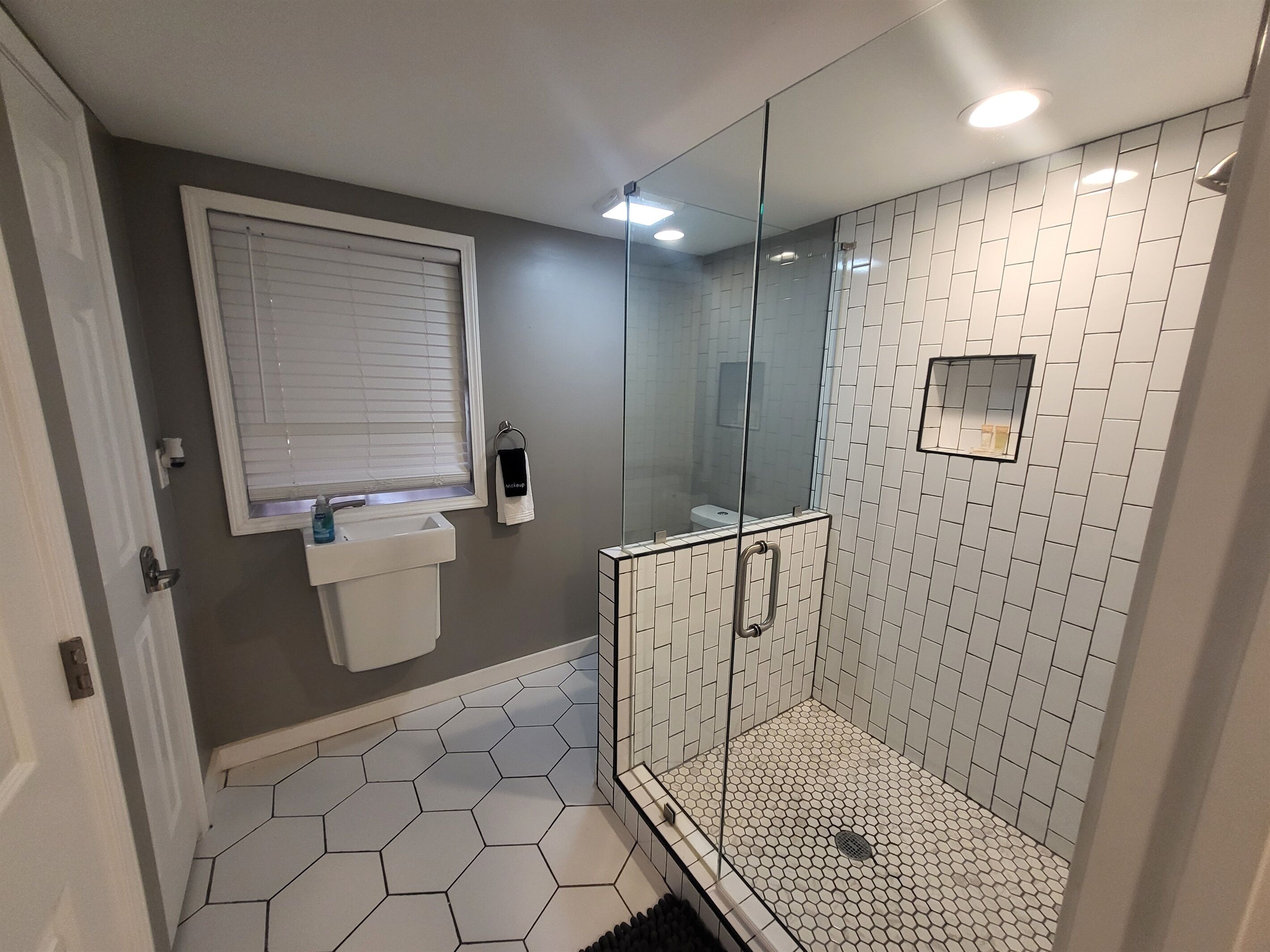 Bathtub, hair dryer, towels