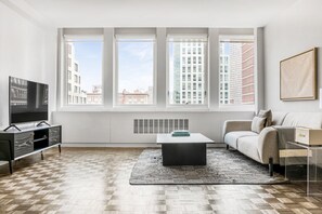 TV, stereo, offices - Amazing Back Bay 1BR w/ W/D & Gym, near Copley T & Shops, by Blueground (Boston)