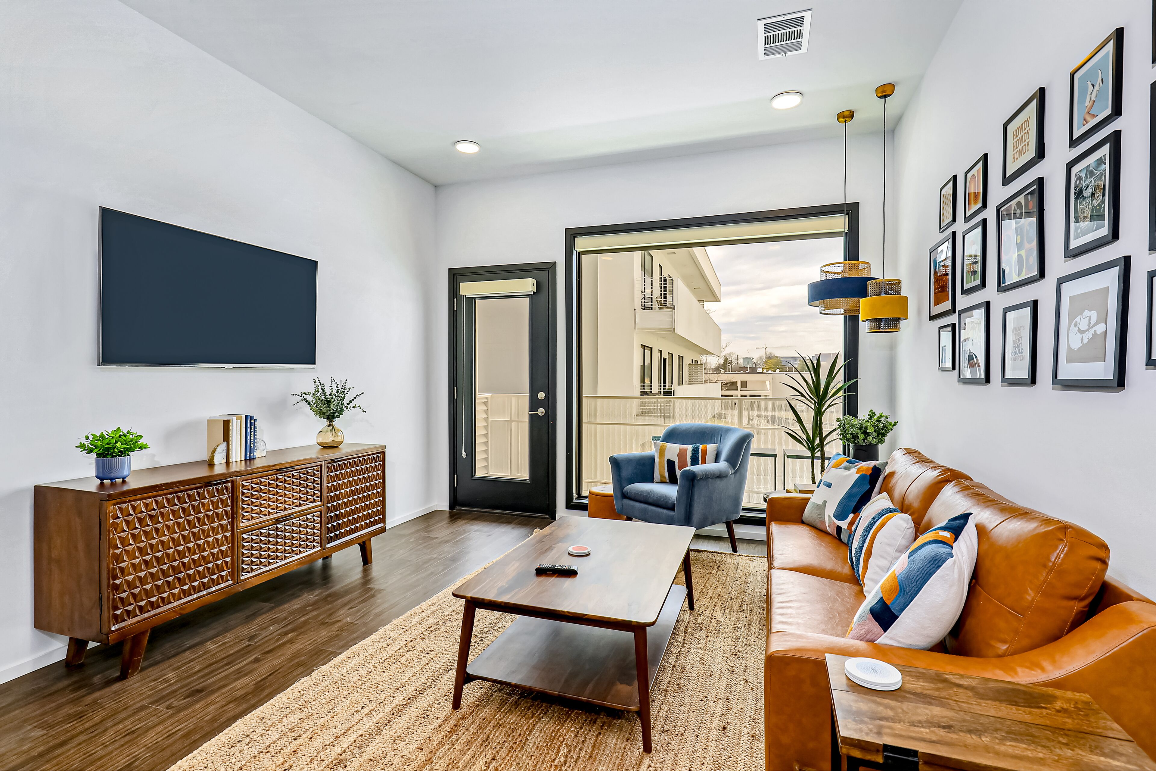 Chic third-floor condo with shared pool, WiFi, W/D, & AC - great location