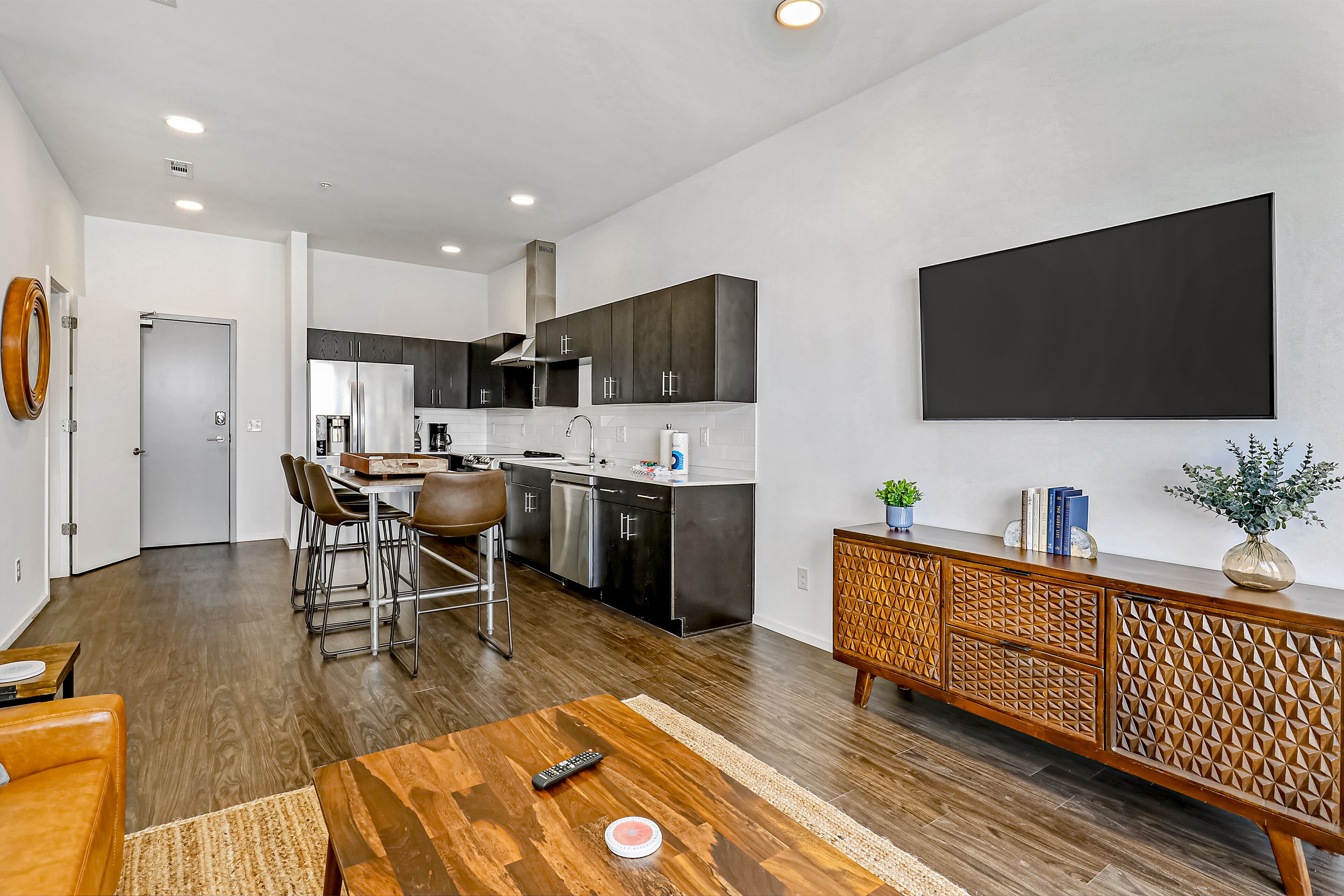 Chic third-floor condo with shared pool, WiFi, W/D, & AC - great location