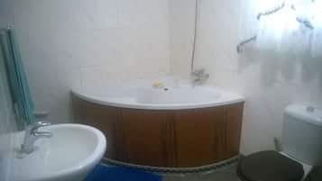 Combined shower/tub