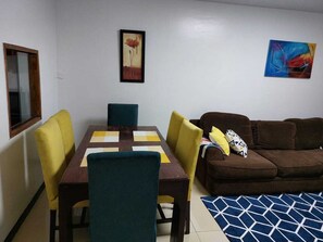 Deluxe Apartment | Living area | 20-inch Smart TV with digital channels, TV - Stay.Plus Kirichwa Road Apartment (Nairobi)