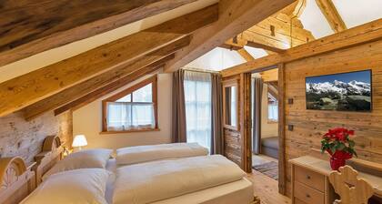 Ferienwohnung Piz da Peres - Geiselsberg mit Bergblick, Pool, Sauna, WLAN & Garten