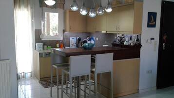 Villa | Private kitchen | Fridge, microwave, dishwasher, electric kettle