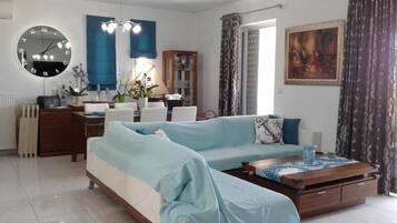 Villa | Living area | 32-inch plasma TV with digital channels, TV, fireplace