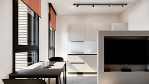 Studio – deluxe, 1 kingsize-seng, ikke-røyk, fjellutsikt | Oppholdsområde