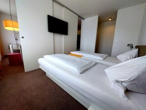 Suite | In-room safe, desk, laptop workspace, soundproofing