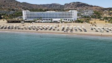 On the beach, white sand, free beach shuttle, beach bar