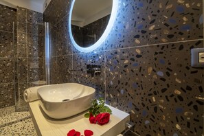 Shower, eco-friendly toiletries, hair dryer, bidet