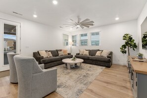 Townhome, 5 Bedrooms | Living area | 50-inch flat-screen TV with cable channels, Smart TV, streaming services - Desert Color Lake House by RedAwning (St. George)